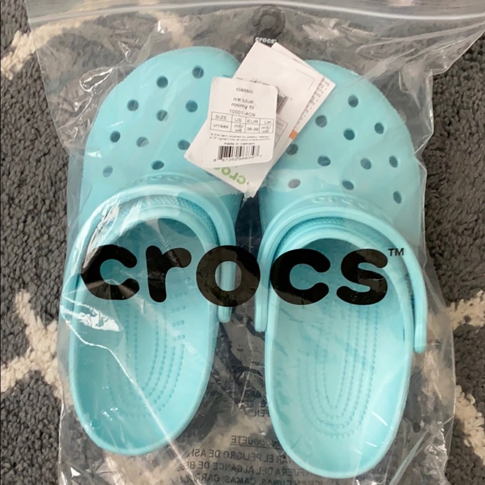 Brand new with tags croc clogs size 8 ice blue